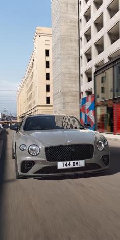 Bentley Continental GT S V8 in Cambrian Grey colour featuring Black gloss radiator matrix grille with black surround, parked in urban setting.