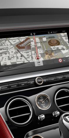 Infotainment system of Bentley Continental GT S with 12.3 inch display screen featuring HDD navigation.