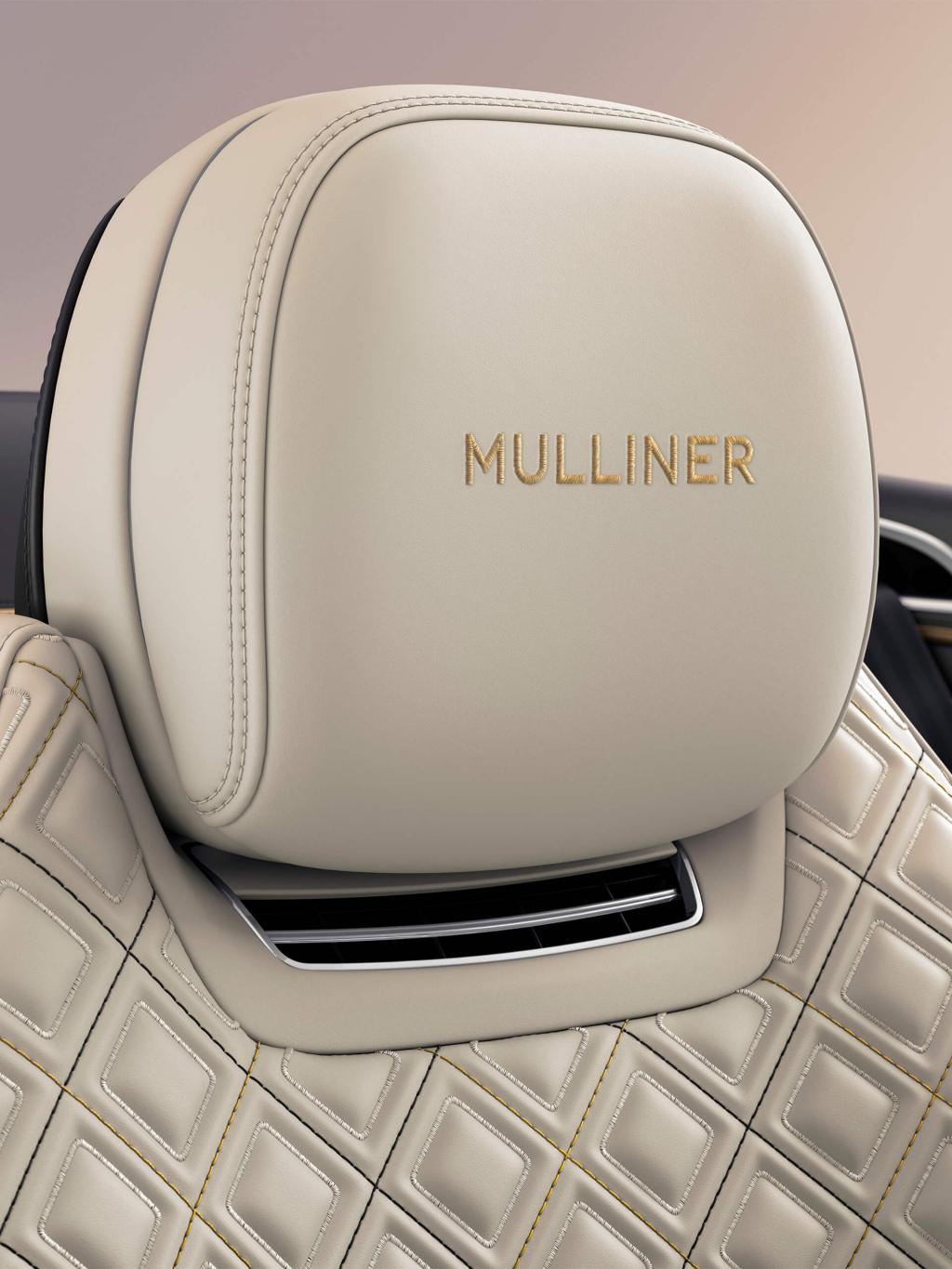 "Front seat view of Bentley Continental GTC Mulliner in Linen Hide and Embroidered Mulliner Emblems. "
