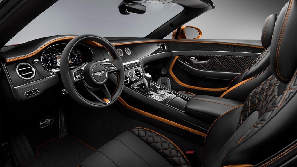 Bentley Continental GTC Speed driver's view - featuring Single Tone, 3 spoke steering wheel in High Gloss Carbon Fibre veneer and Mandarin by Mulliner hide.