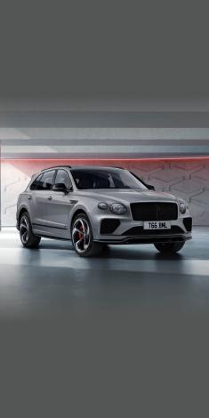 Bentley Bentayga S in Cambrian Grey colour side angled view featuring 22 inch S Directional Wheel - Black Painted and Polished with matrix grille.