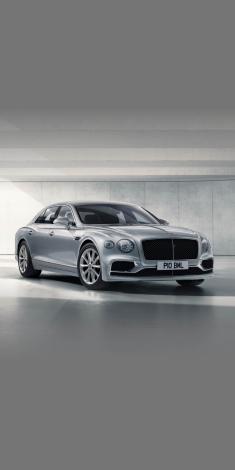 Front side angled view of Bentley Flying Spur in Silver colour, featuring 20 inch Five Twin - Spoke Wheel - Painted.