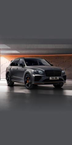 Bentley Bentayga S in Cambrian Grey colour side angled view featuring 22 inch S Directional Wheel - Black Painted and Polished with matrix grille.