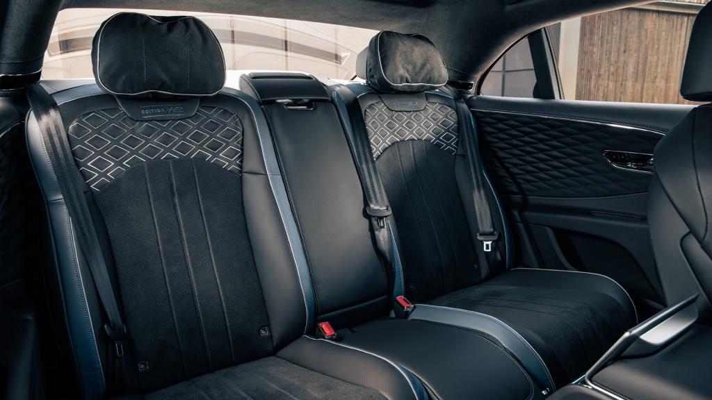 Rear seat of Bentley Flying Spur Speed Edition 12 featuring Diamond quilt pattern seats in Beluga hide with contrast stitching complemented by Linen Hide.