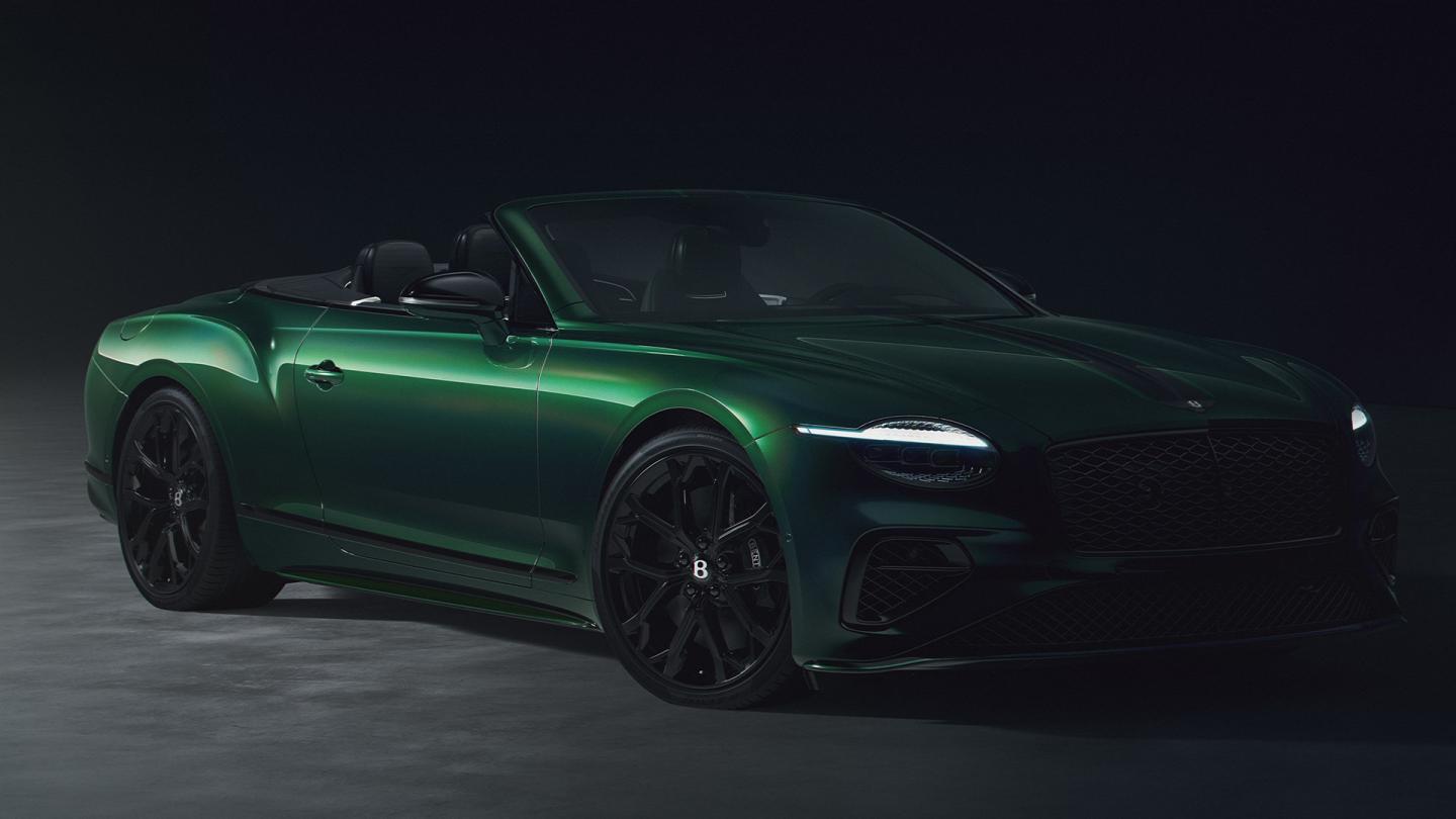 Close up of the front 3/4 of the Bespoke Series 2027 Bentley Continental GTC S in Spectral Verdant.