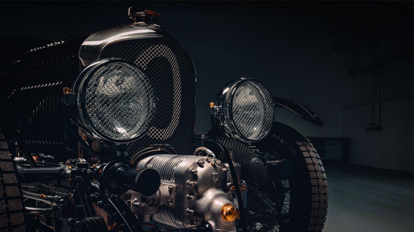 Front view of Bentley Blowe featuring two halogen headlamps in chrome grilled covering.