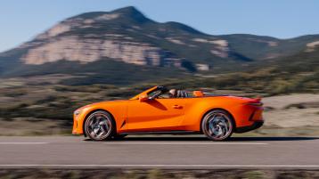 Bentley Batur Convertible by Mulliner in Satin Orange Flame, side view featuring 22" 5 spoke directional alloy wheel 