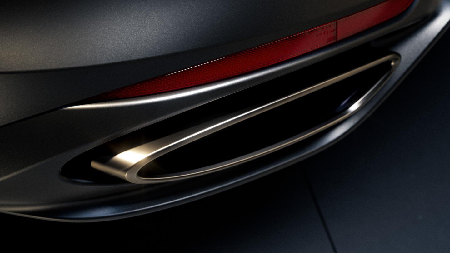 Close up of the gold exhaust tips of a Continental GT Convertible from the Virtuoso Collection