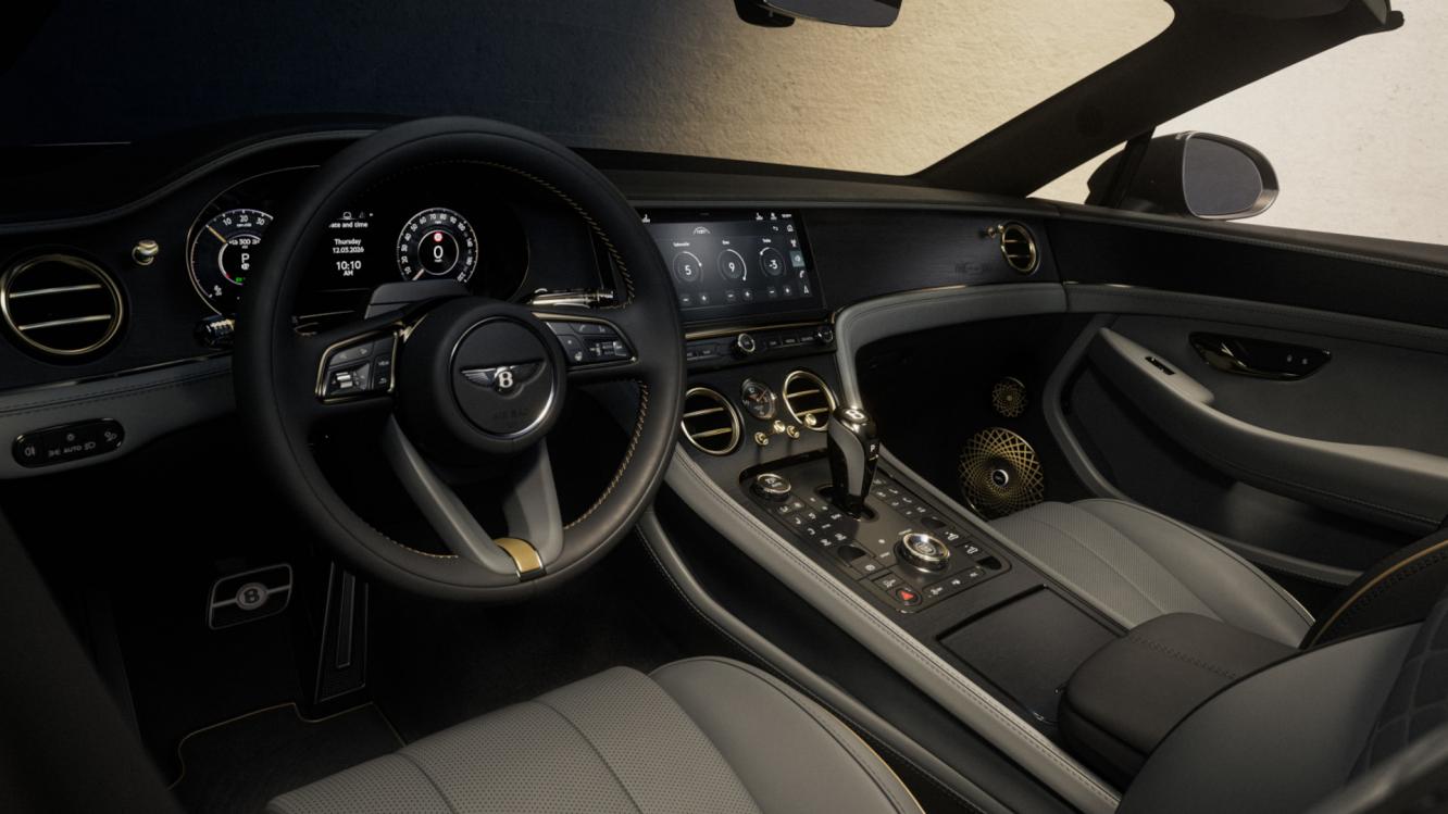 The front cabin of a Continental GT Convertible from the Virtuoso Collection featuring bespoke elements throughout the cabin