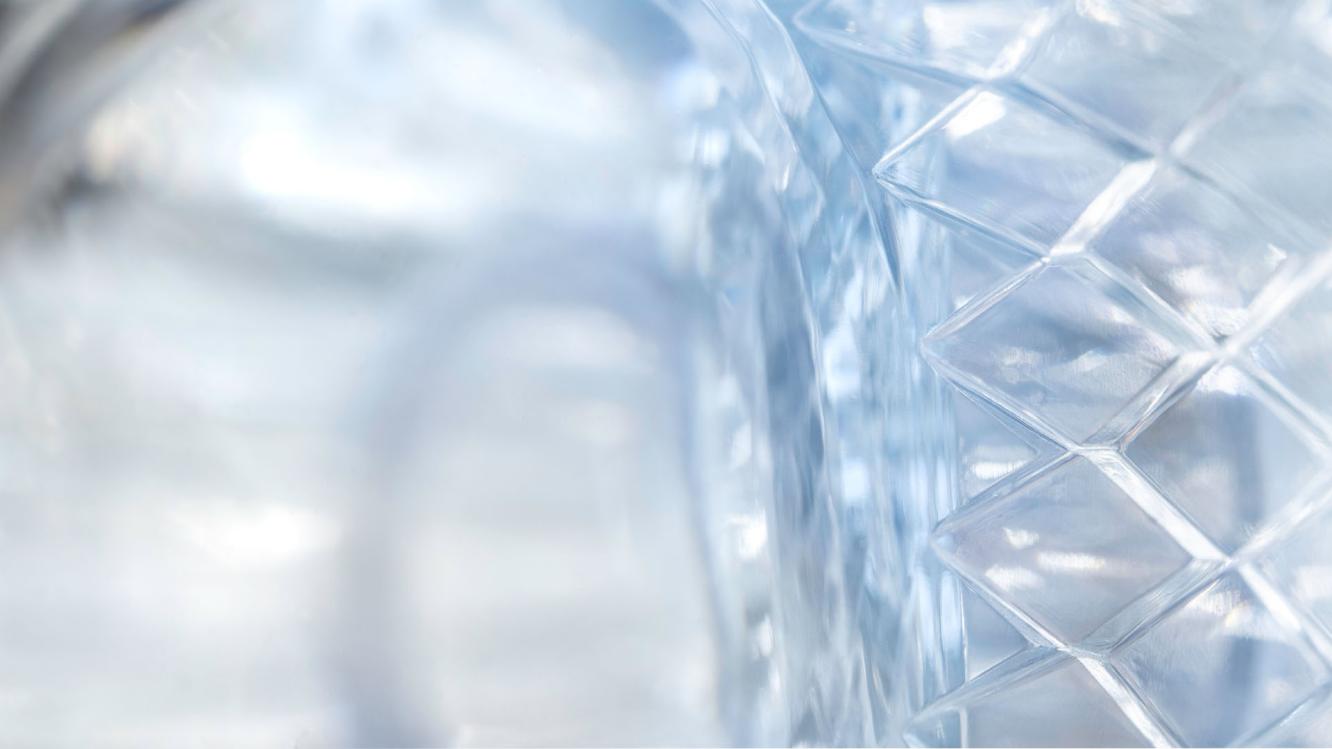Zoomed in landscape view of Bentley Flying Spur headlights featuring crystal cut design.