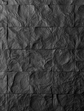 Textured view of patterned Granite wall.