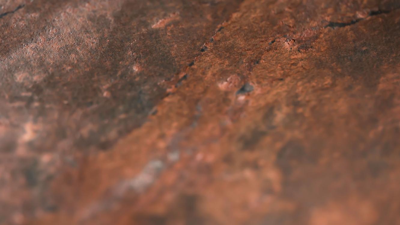 Detailed textured view of Terra Red stone veneer