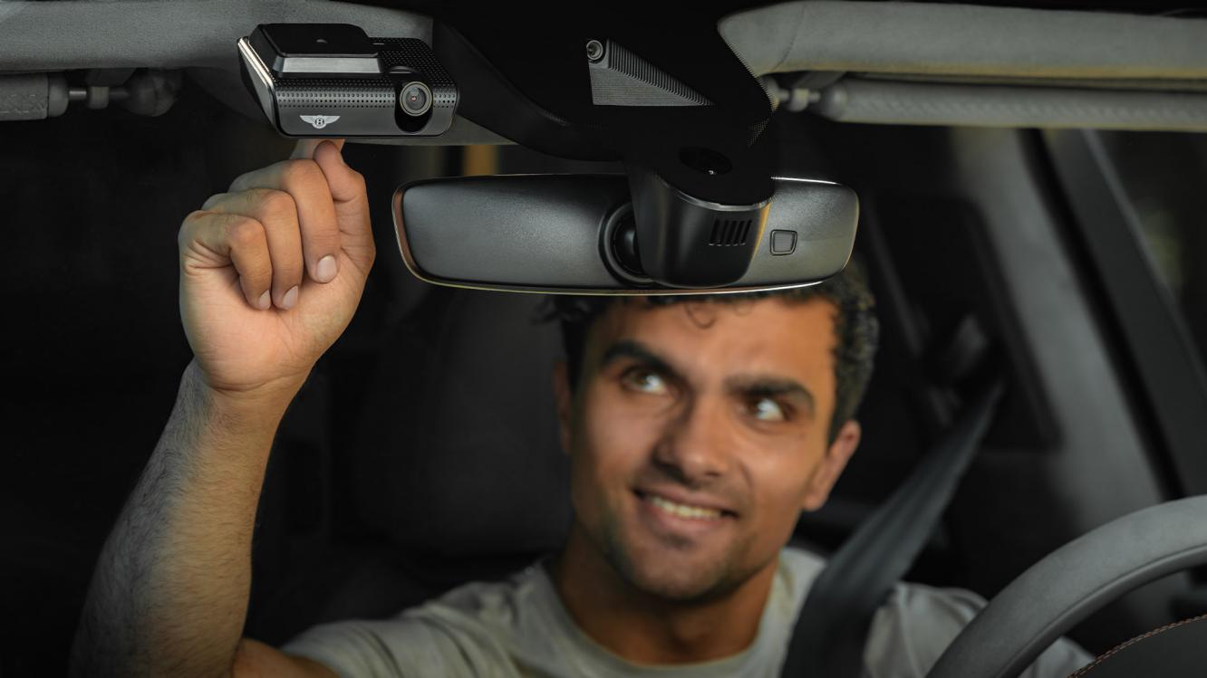 A close up of the front view camera available as part of Bentley Double Drive Vision