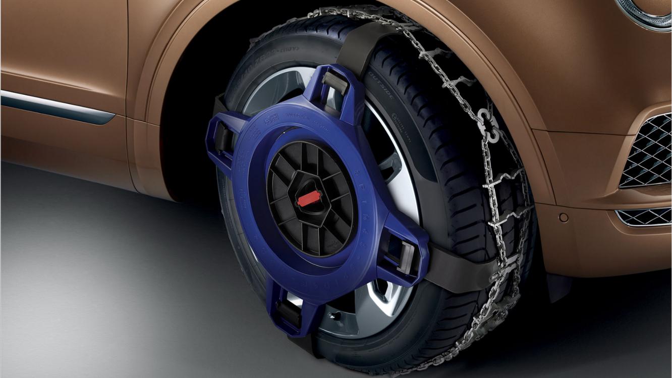 A close up Bentley snow chains on a Bentayga