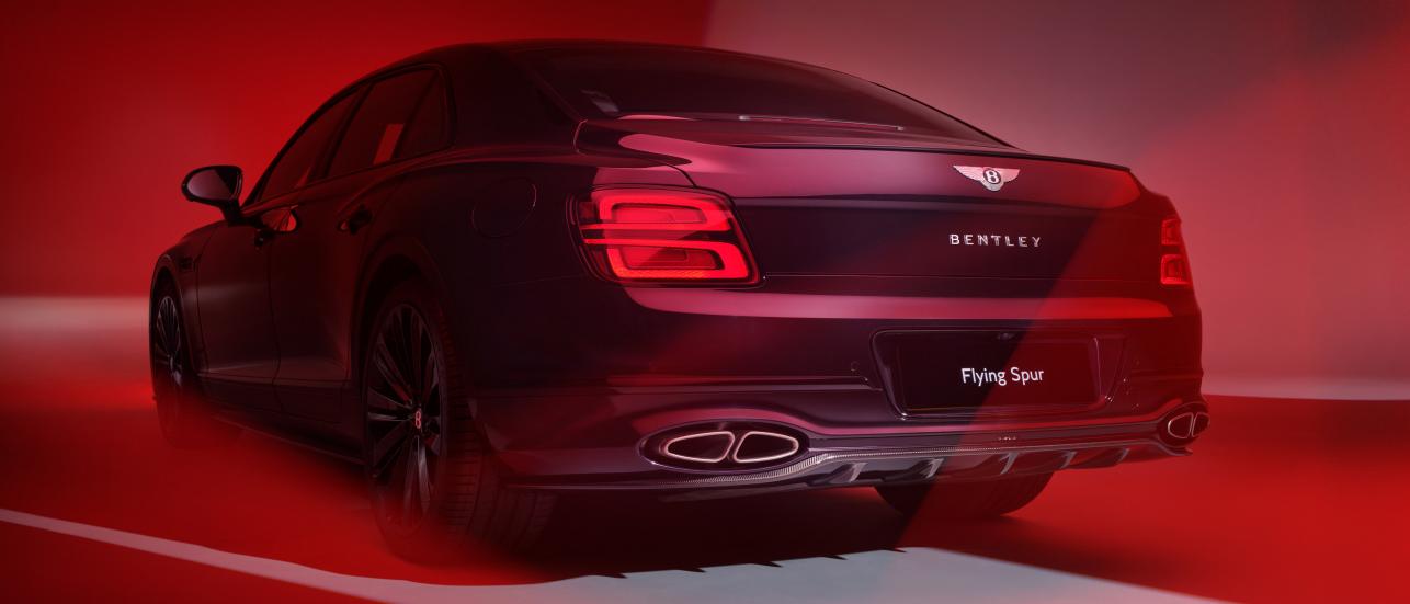Rear three quarter of the Flying Spur Speed featuring Blackline Specification, Carbon Styling Specification and Akrapovic Titanium Sports Exhaust