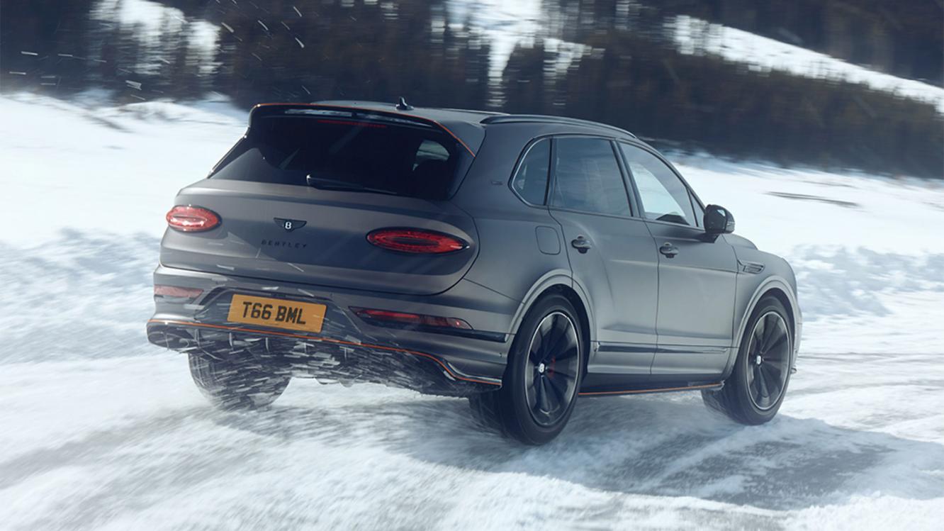 Bentley Bentayga S Black Edition drifting on snow while equipped with Bentley winter wheels and tyres