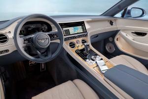 Interior of Bentley Continental GTC Azure with a mobile phone connected to the infotainment system