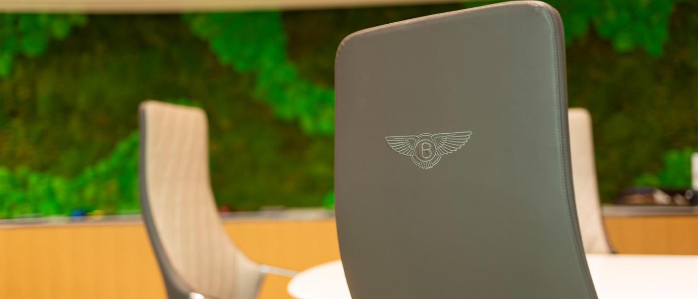A chair featuring Bentley Wings emblem in contrast stitching.