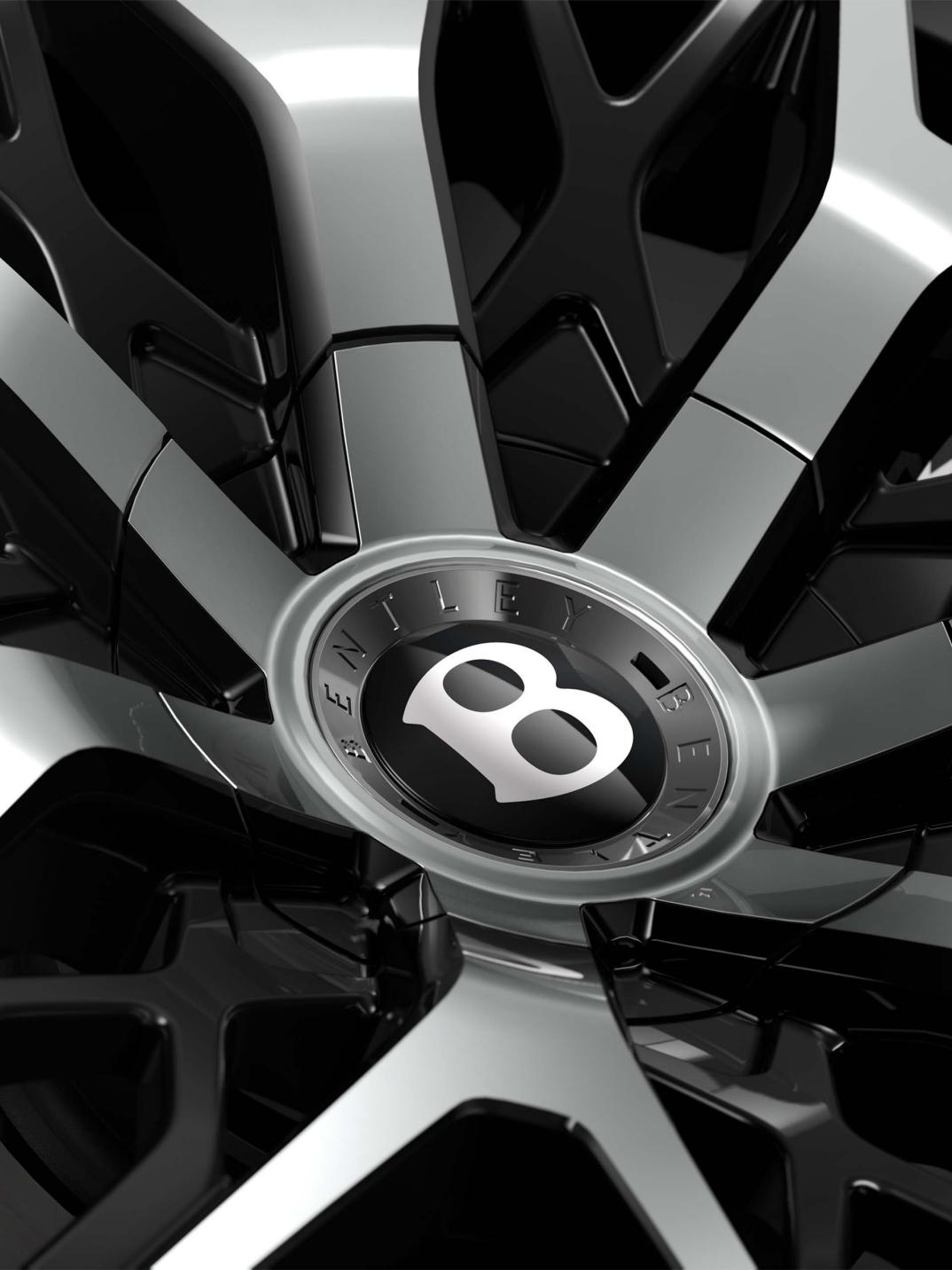 Close-up of the Bentley Torcal S 22" First Edition Wheel in Black with Liquid Silver Spokes.