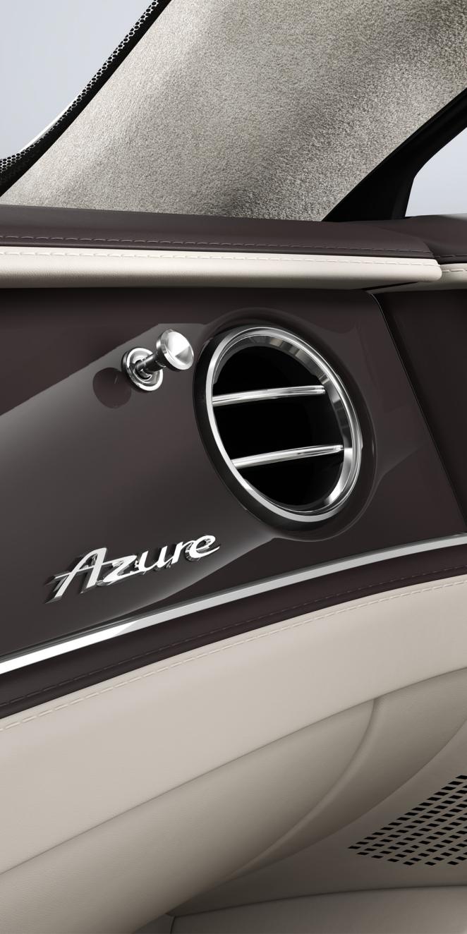 Close-up of the Piano Burnt Oak veneer and air conditioning vent inside the Bentley Flying Spur Azure.