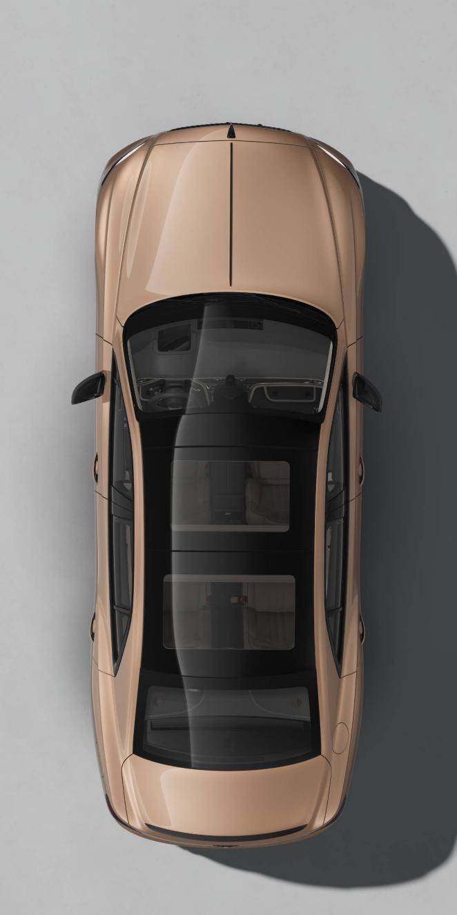 Top down, roof view of the Bentley Flying Spur S in Rose Gold with Blackline Specification and dark exterior detailing.